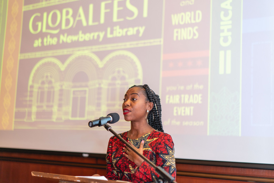 A woman speaks passionately at a podium during the 2021 Globalfest event at the Newberry Library.