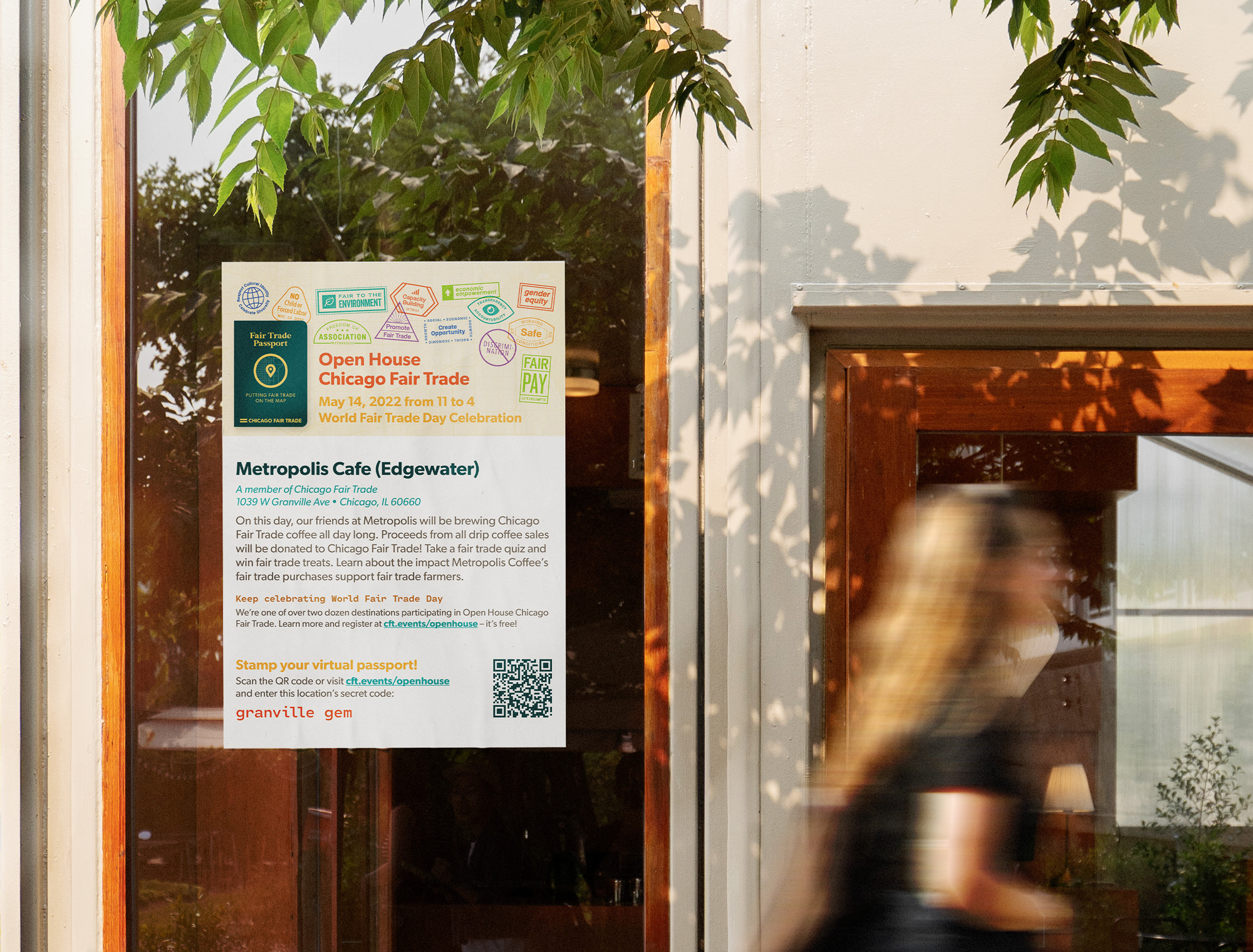 Check-in sign with a QR code and instructions to scan the code to get a passport stamp.